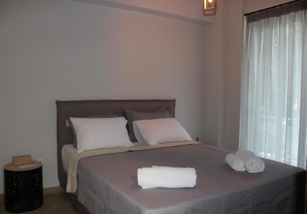 Posteľ alebo postele v izbe v ubytovaní Ventiri Family Suite 1
