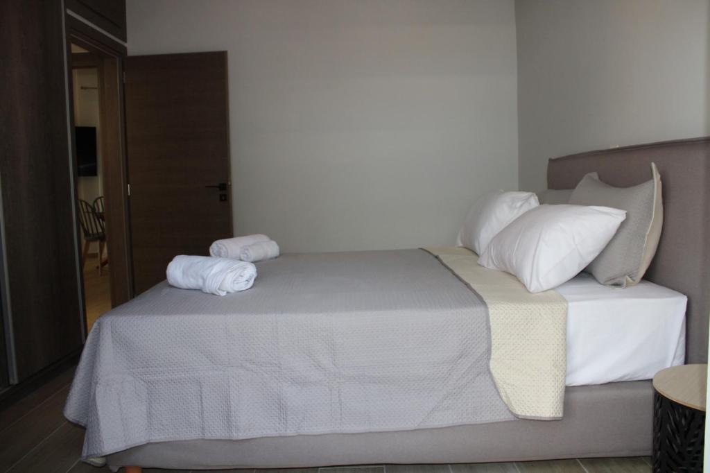 Posteľ alebo postele v izbe v ubytovaní Ventiri Family Suite 1