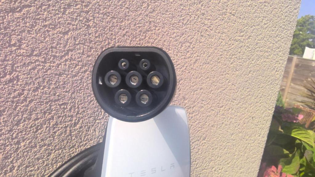 a security camera attached to a wall at Tous à l'ouest in Combrit