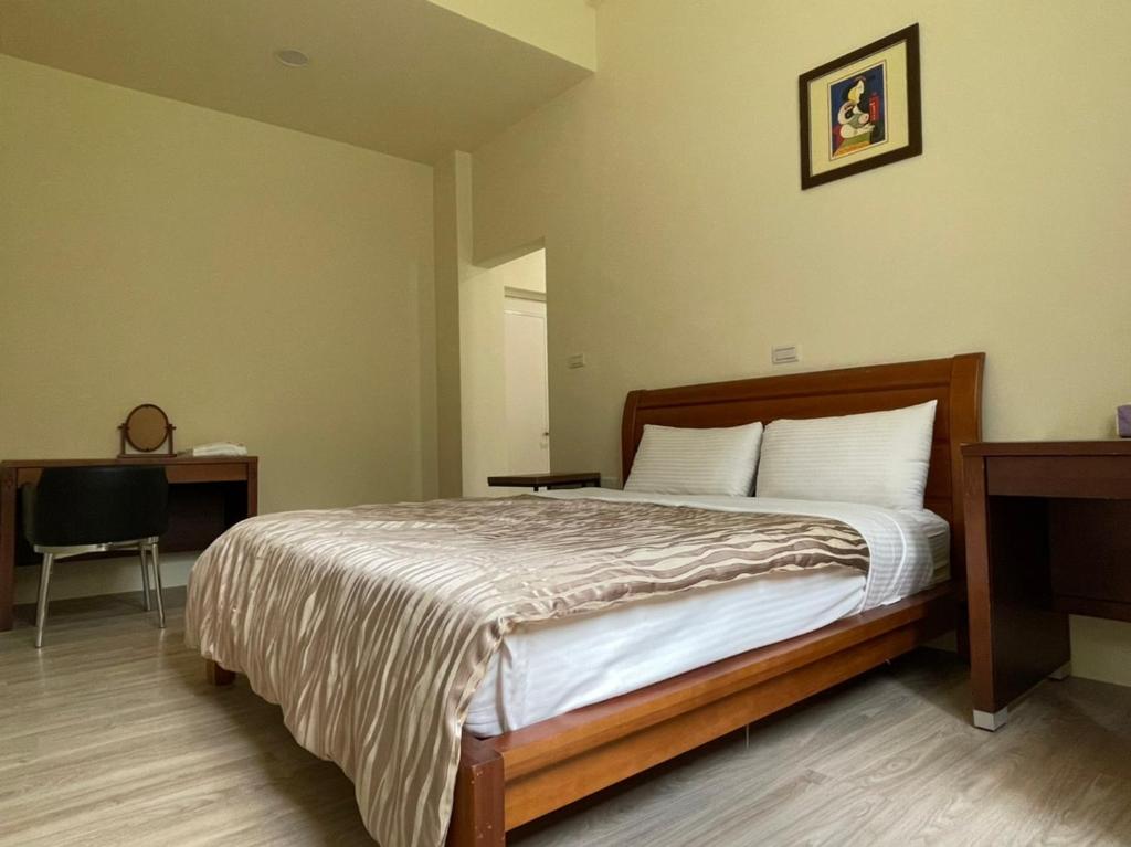 Postel nebo postele na pokoji v ubytování Taomi 5211 B&B
