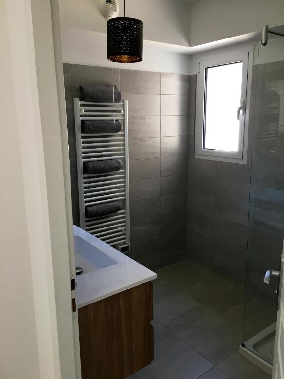 Kúpeľňa v ubytovaní Appartement moderne à Bastia de 57 m² avec vue mer exclusive