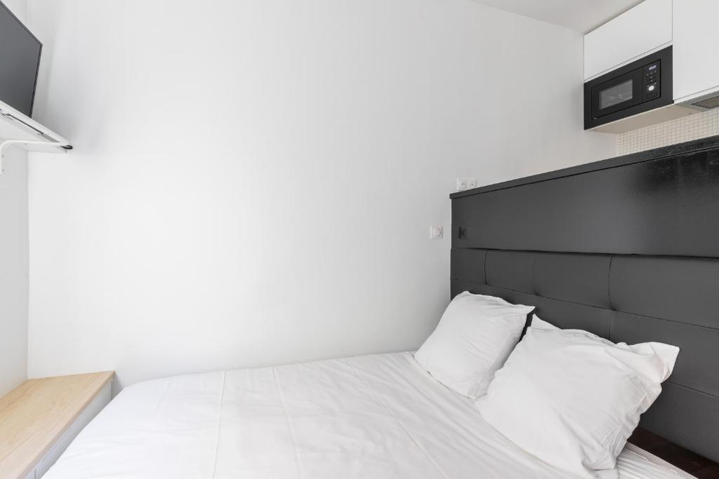 Posteľ alebo postele v izbe v ubytovaní Studio 2Pers#Les Halles#Etienne Marcel#AC