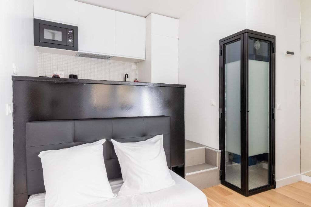 Posteľ alebo postele v izbe v ubytovaní Studio 2Pers#Les Halles#Etienne Marcel#AC