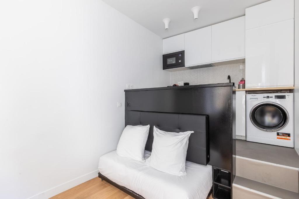 Posteľ alebo postele v izbe v ubytovaní Studio 2Pers#Les Halles#Etienne Marcel#AC