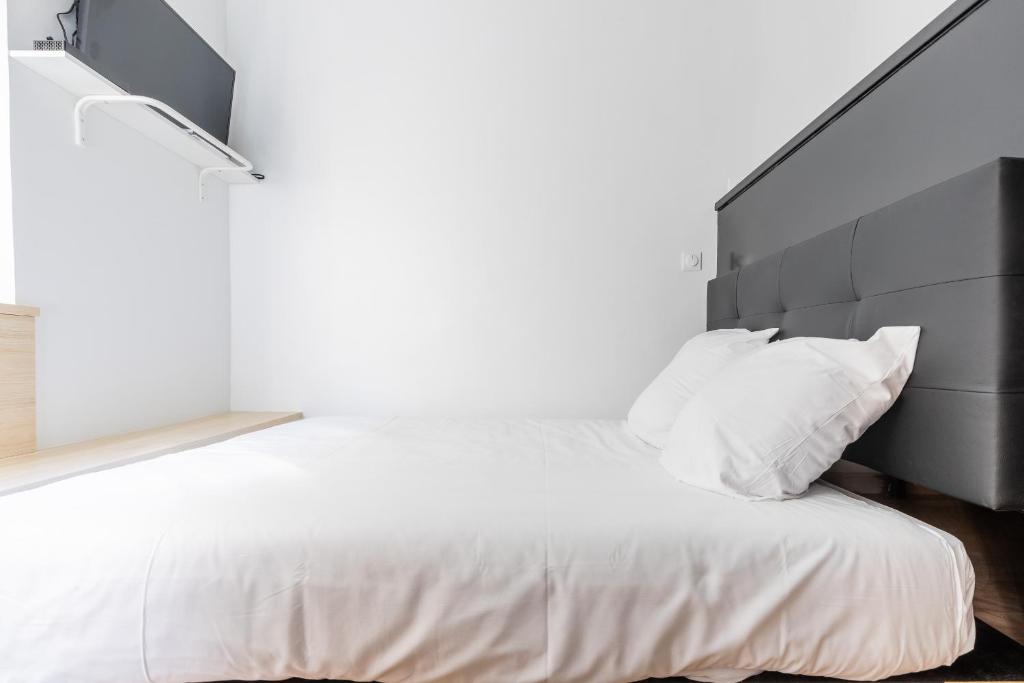 Posteľ alebo postele v izbe v ubytovaní Studio 2Pers#Les Halles#Etienne Marcel#AC