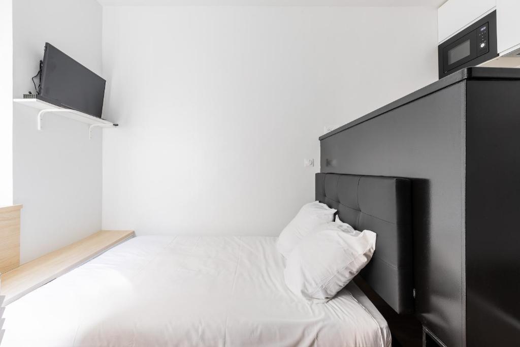 Posteľ alebo postele v izbe v ubytovaní Studio 2Pers#Les Halles#Etienne Marcel#AC