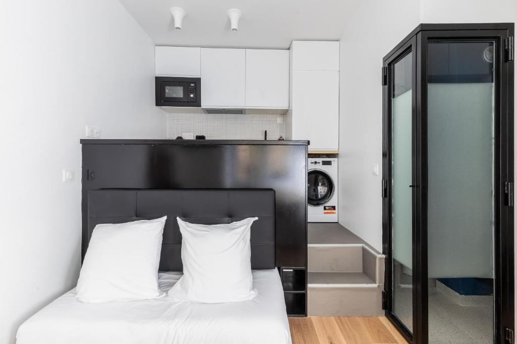 Posteľ alebo postele v izbe v ubytovaní Studio 2Pers#Les Halles#Etienne Marcel#AC