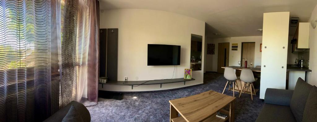A television and/or entertainment centre at 659 apartments