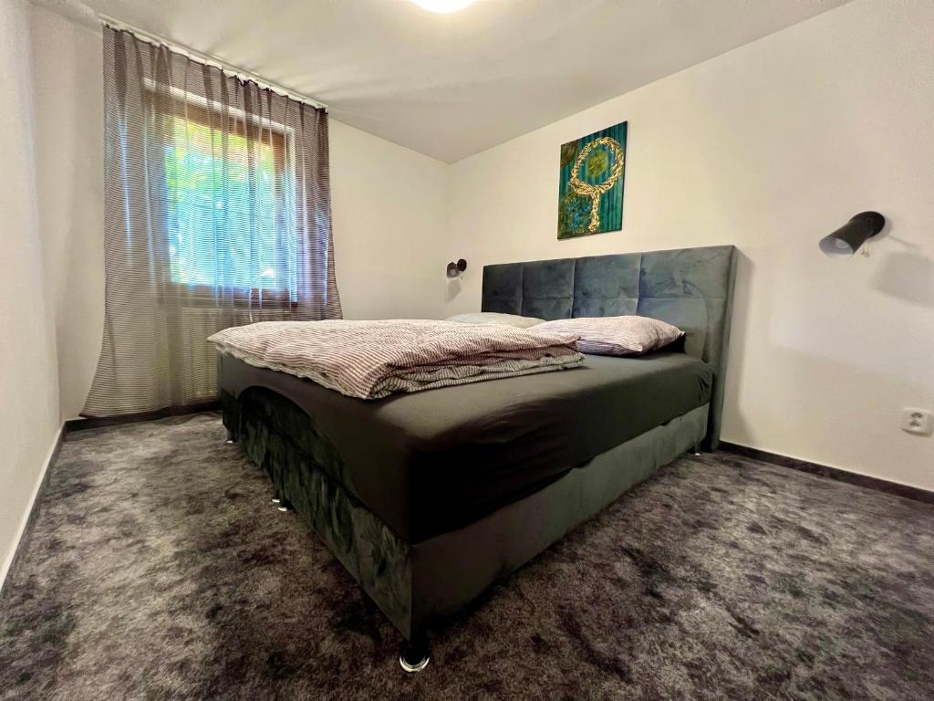 A bed or beds in a room at 659 apartments
