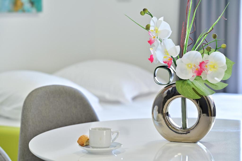 Łóżko lub łóżka w pokoju w obiekcie Résidence Easy Lodge