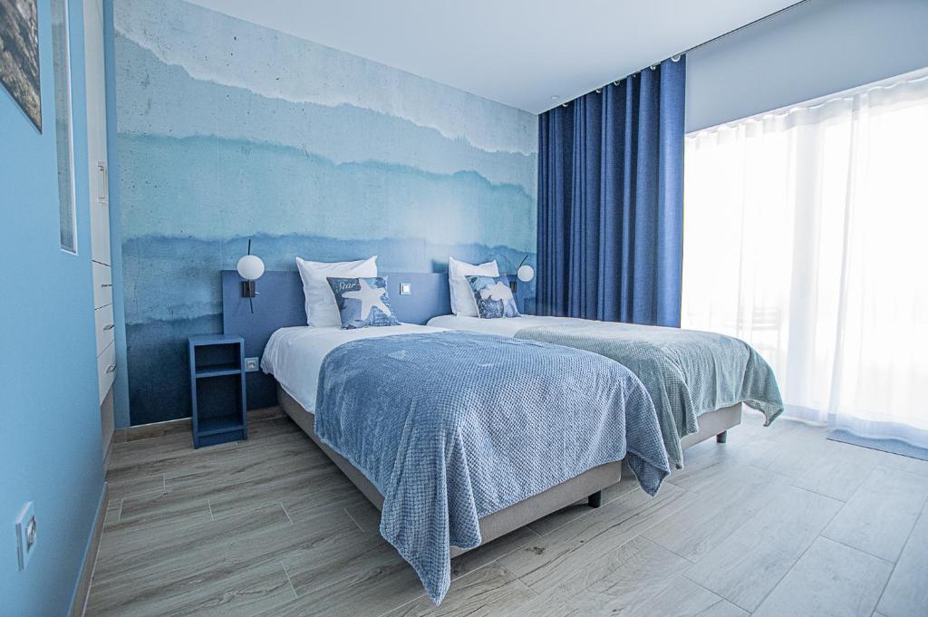 Cama ou camas em um quarto em Océane Guest House - Adults only