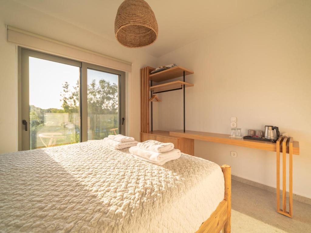 Posteľ alebo postele v izbe v ubytovaní Allure Wellness Retreat