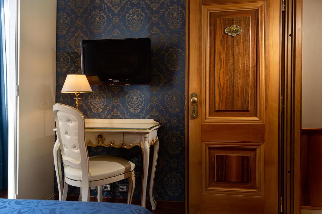TV a/nebo společenská místnost v ubytování Hotel Santa Marina