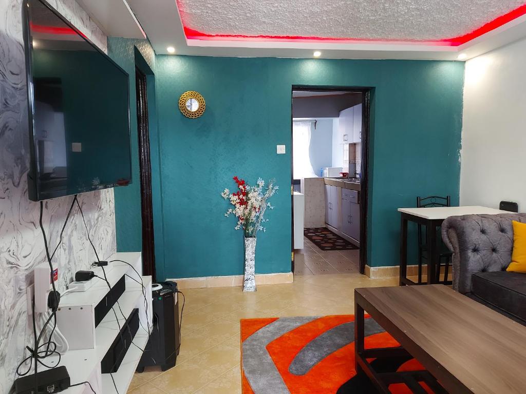 TV a/nebo společenská místnost v ubytování Parkview apartments