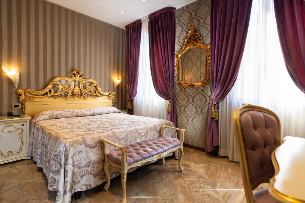 Postel nebo postele na pokoji v ubytování Hotel Santa Marina