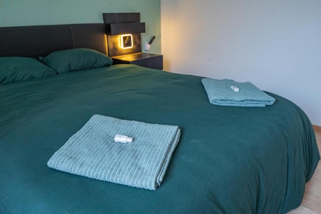 Posteľ alebo postele v izbe v ubytovaní Capstay la Rhonelle - Netflix - 2 chambres - Cuisine