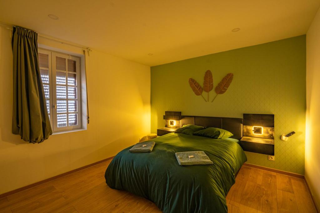 Posteľ alebo postele v izbe v ubytovaní Capstay la Rhonelle - Netflix - 2 chambres - Cuisine