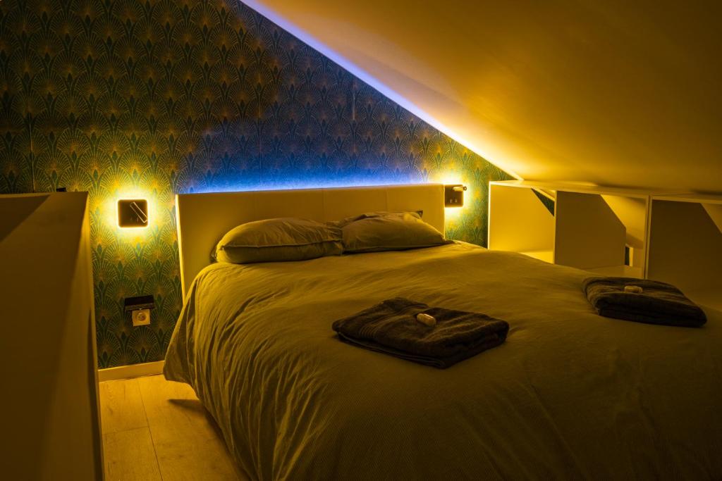 Posteľ alebo postele v izbe v ubytovaní Capstay la Rhonelle - Netflix - 2 chambres - Cuisine