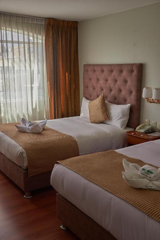 Postel nebo postele na pokoji v ubytování Casona Plaza Hotel Arequipa