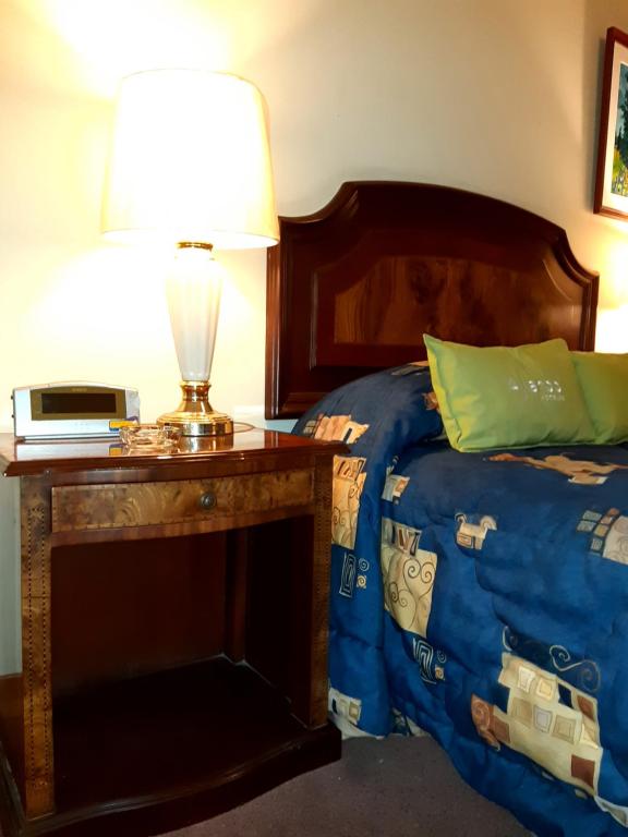Postel nebo postele na pokoji v ubytování Hotel MAURY