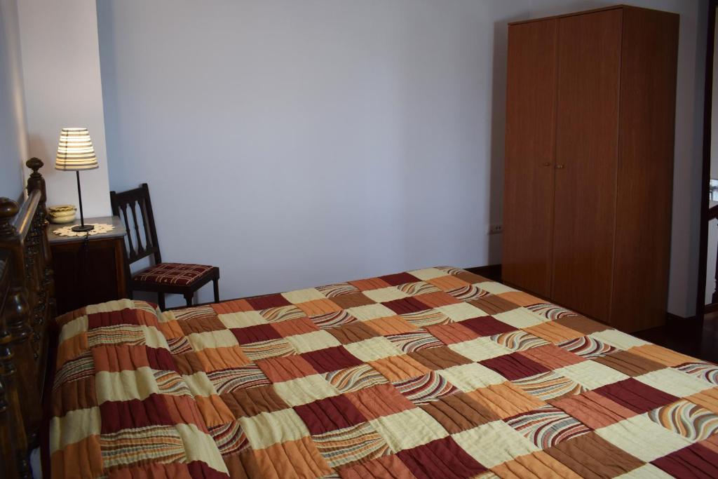 Posteľ alebo postele v izbe v ubytovaní Apartamentos Rurales la Taberna