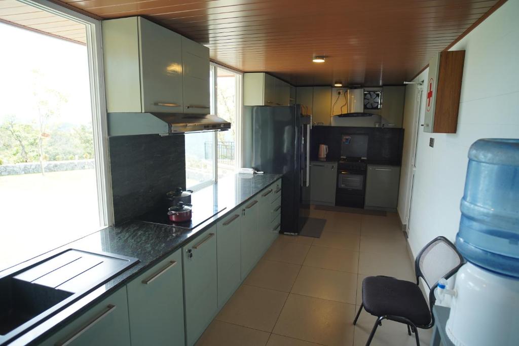 Kuchyň nebo kuchyňský kout v ubytování Cinnamon Serenity Villa