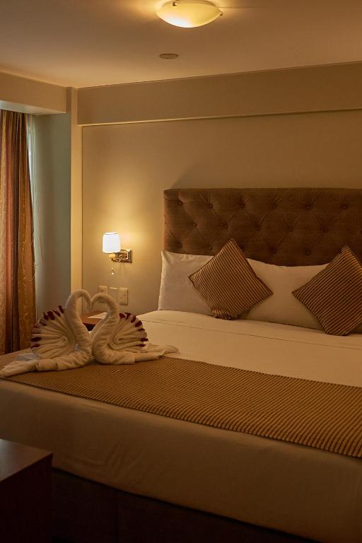 Postel nebo postele na pokoji v ubytování Casona Plaza Hotel Arequipa