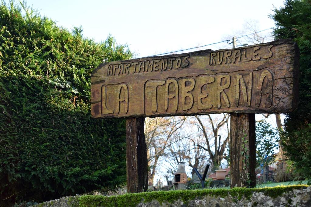 a sign that reads propertiesaurusaurusaurusannisannisannisannisannisneauneau at Apartamentos Rurales la Taberna in Matienzo