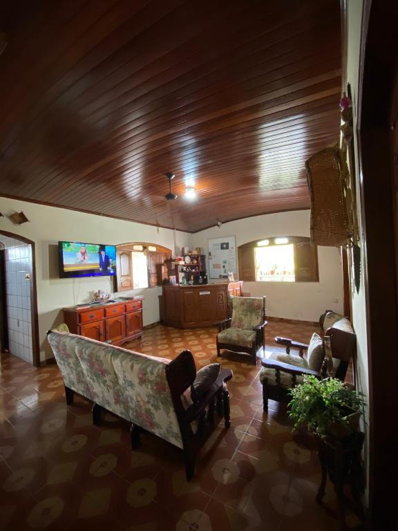 TV a/nebo společenská místnost v ubytování Hostel Roraima