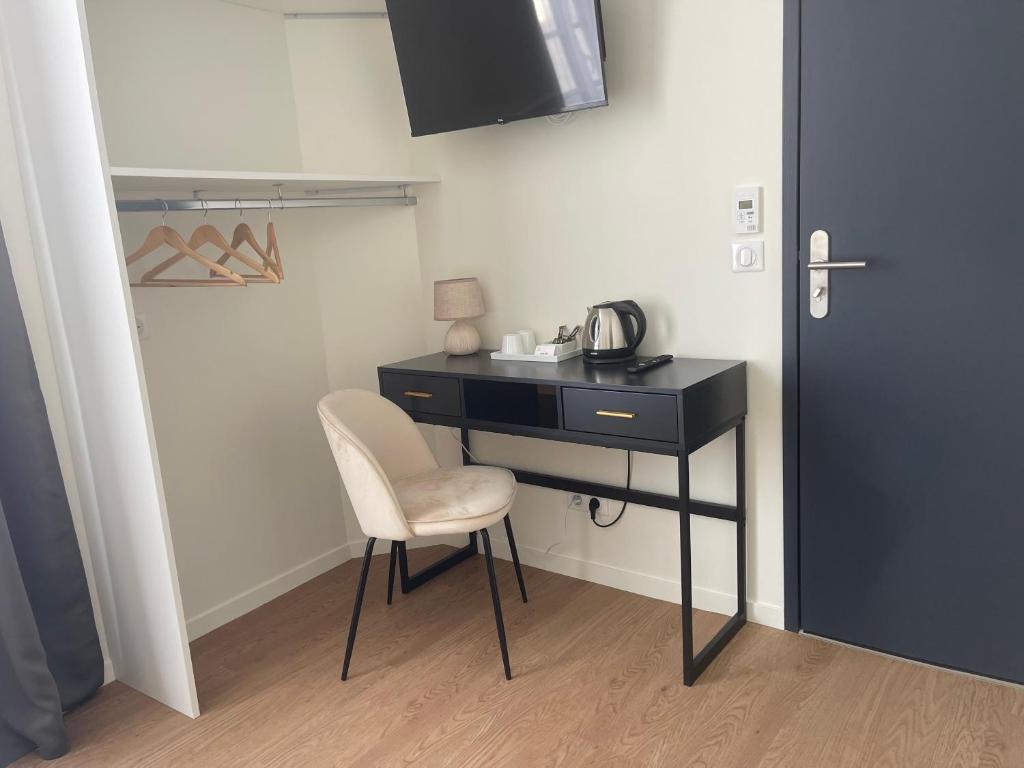 Kuchyň nebo kuchyňský kout v ubytování Hôtel de la Glane