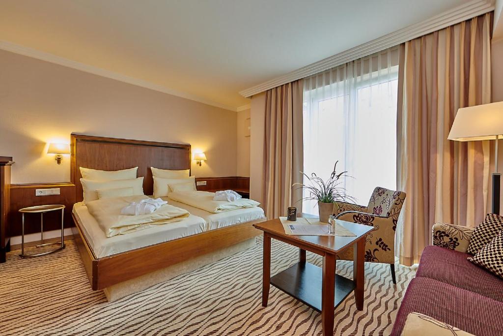 Postel nebo postele na pokoji v ubytování Hotel Reinerhof