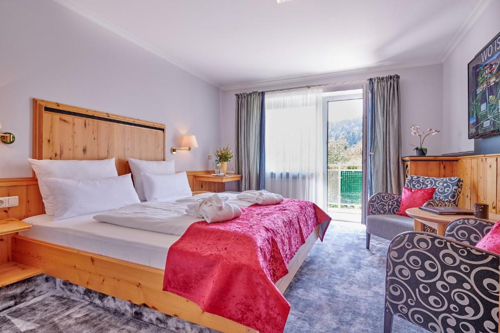 Postel nebo postele na pokoji v ubytování Hotel Reinerhof