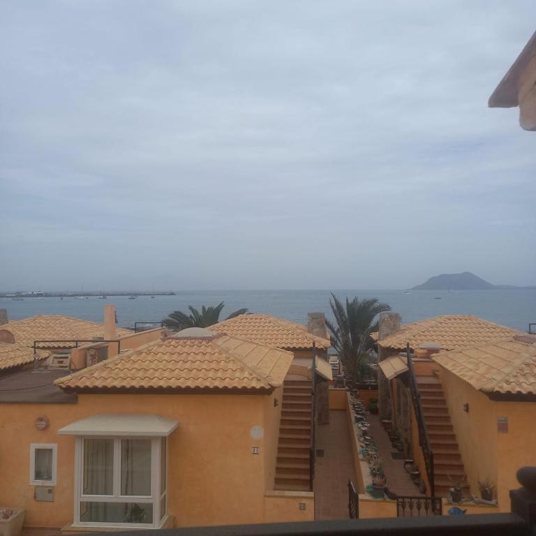 a view of the roofs of some houses at Villa Sara y Sebas in Corralejo