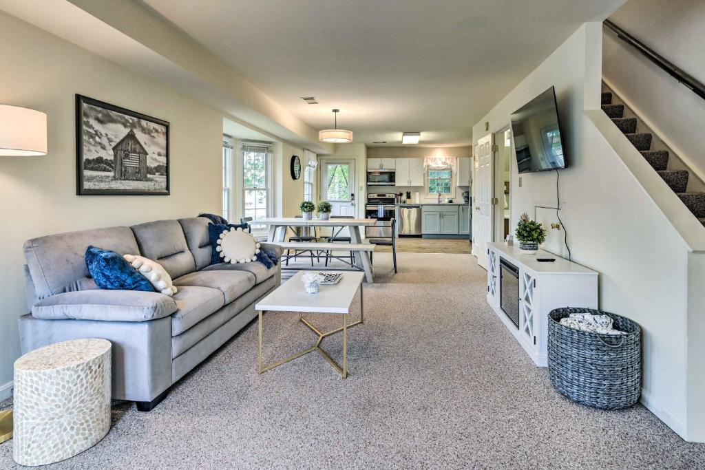 a living room with a couch and a table at Historic Dtwn Home 2 Mi to Military Park! in Gettysburg