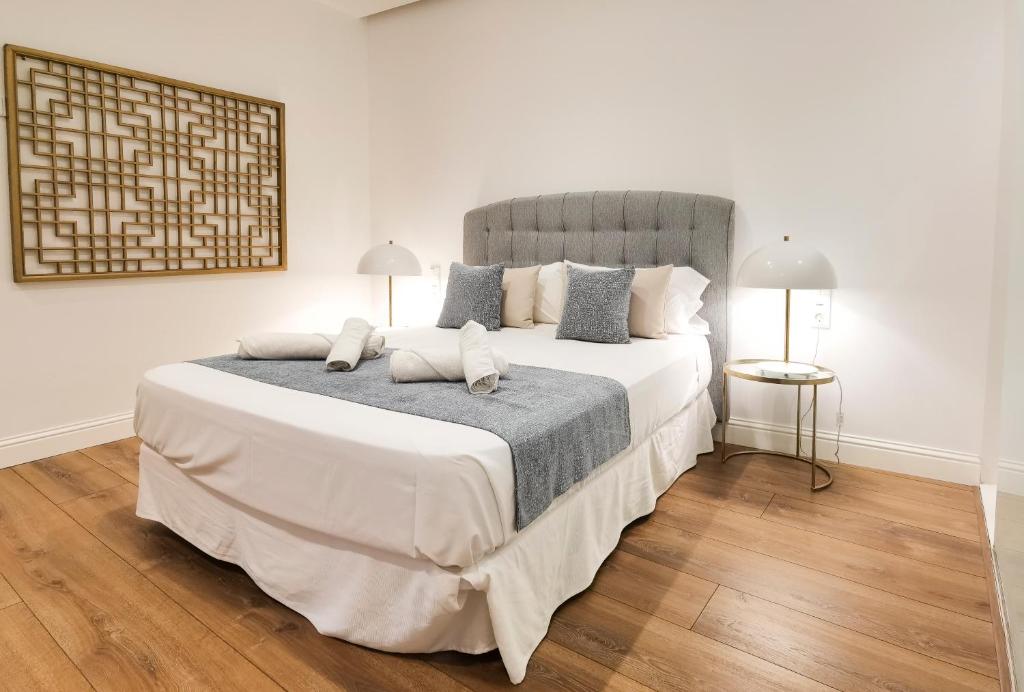 Postel nebo postele na pokoji v ubytování Torres de Serranos Apartments - TTdSSa VLC