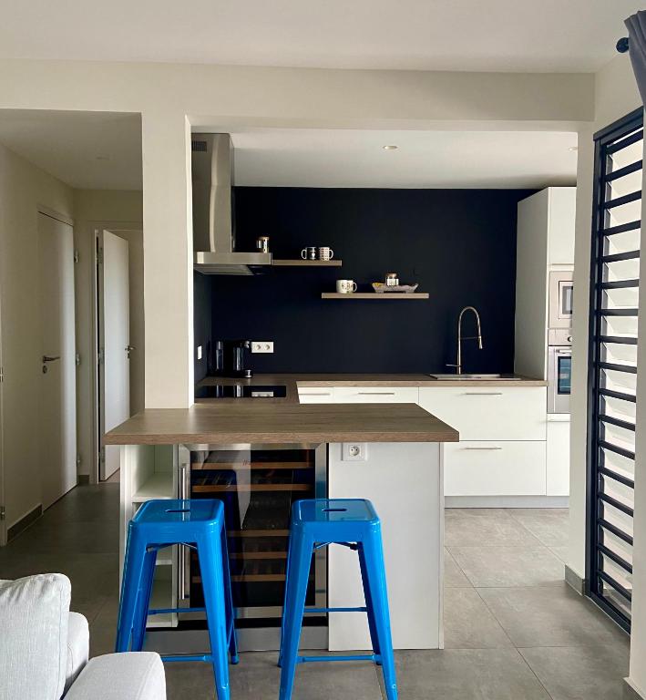 Una cocina o cocineta en Meherio - Bel Appartement vue mer à TAHITI