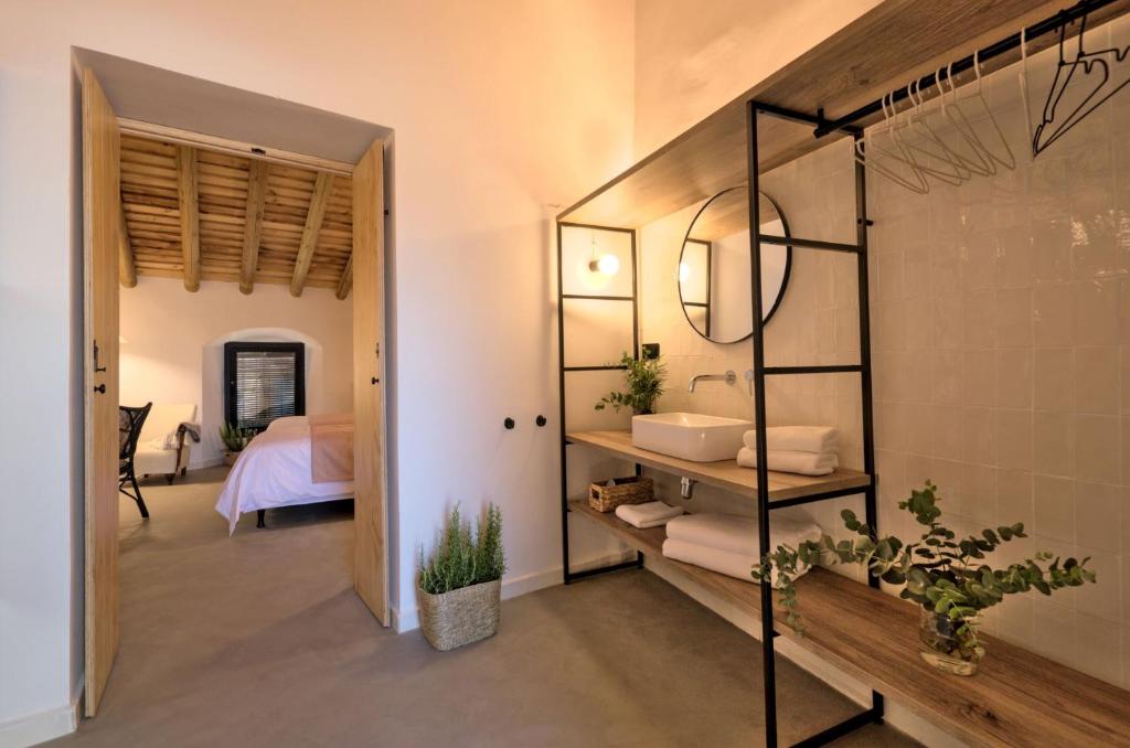 Postel nebo postele na pokoji v ubytování Hotel Casa Ernestina