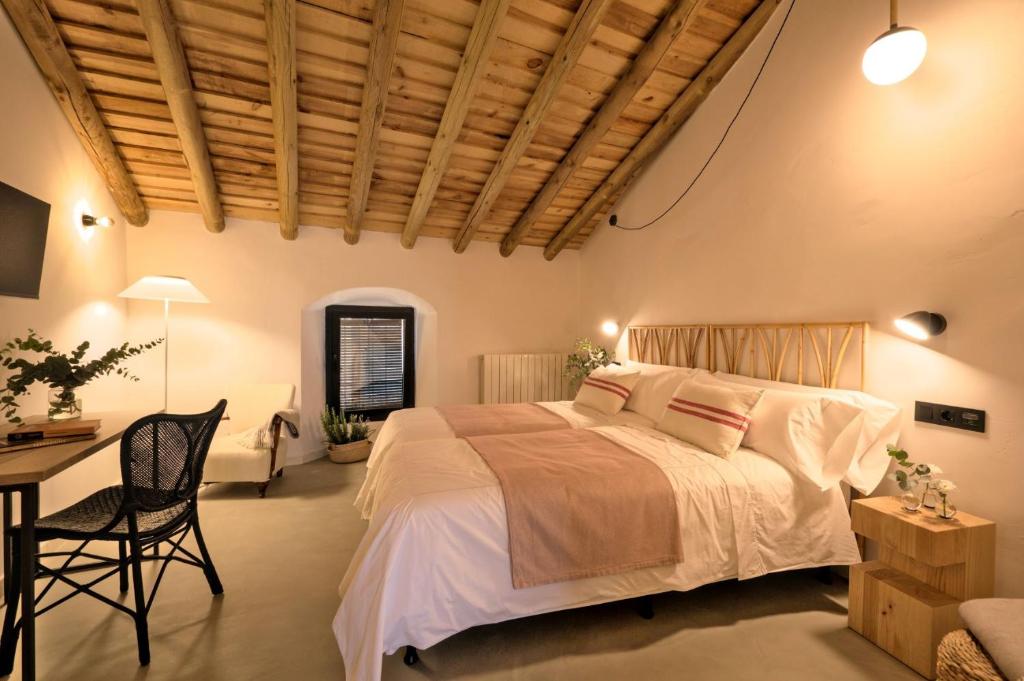 Postel nebo postele na pokoji v ubytování Hotel Casa Ernestina