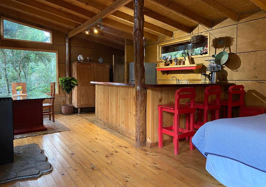 Kuchyň nebo kuchyňský kout v ubytování Cabañas Los Cantos del Chucao