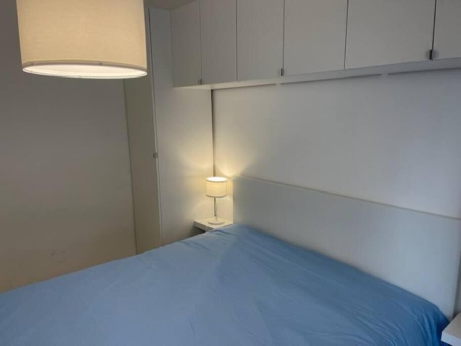 Łóżko lub łóżka w pokoju w obiekcie B&B Taranto Centro