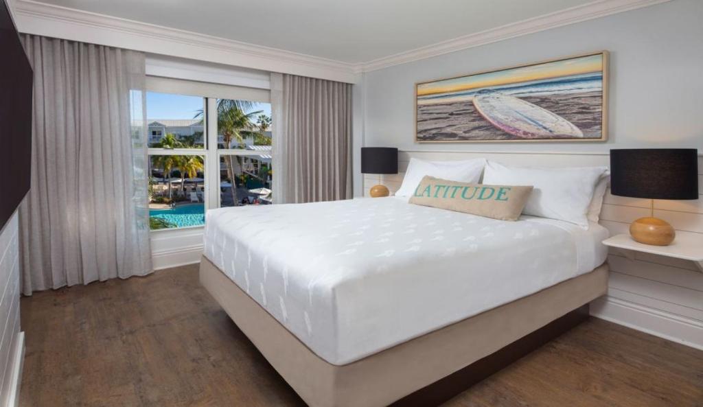 Postel nebo postele na pokoji v ubytování Margaritaville Beach House Key West