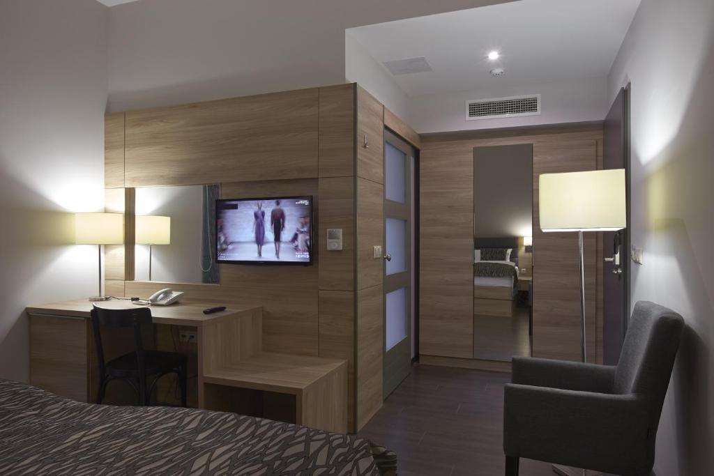 TV a/nebo společenská místnost v ubytování Hotel Therapia