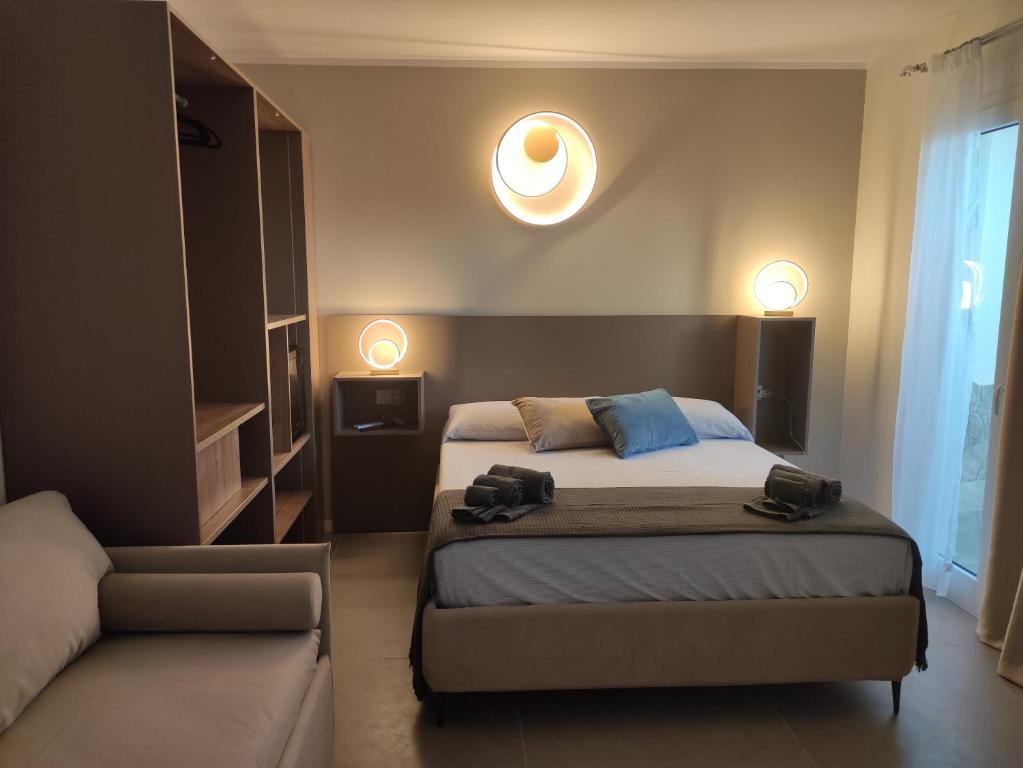 Łóżko lub łóżka w pokoju w obiekcie Live Home Rooms