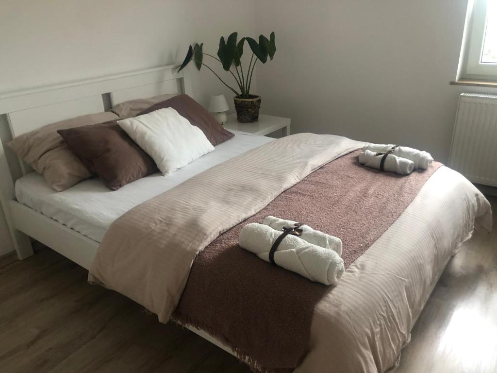 Postel nebo postele na pokoji v ubytování Garden House