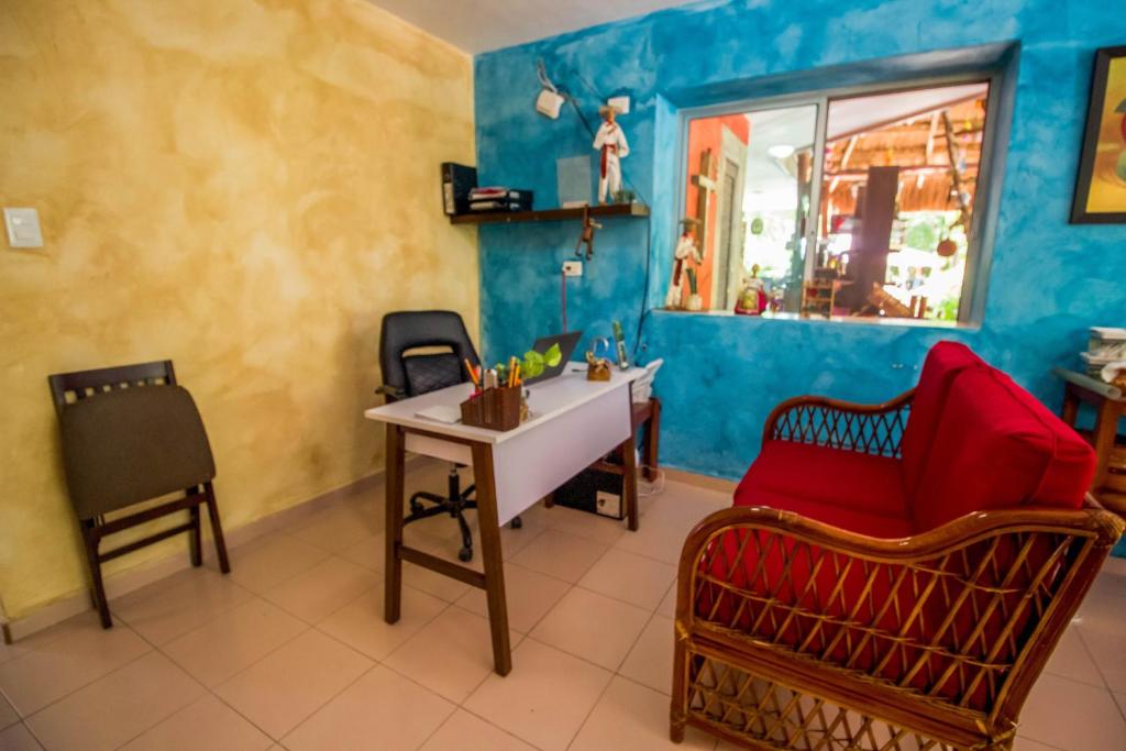 TV a/nebo společenská místnost v ubytování Hotel Tequila Cancun