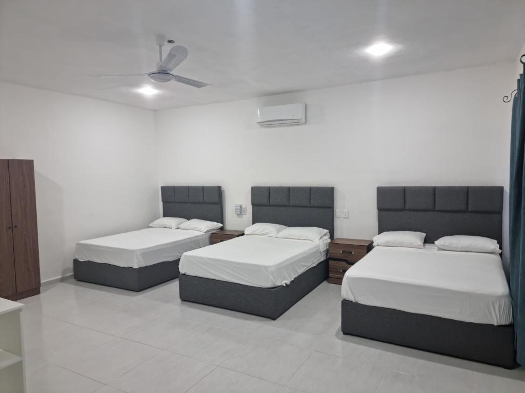 Casa Neptuno Tulum - Deluxe Triple Room