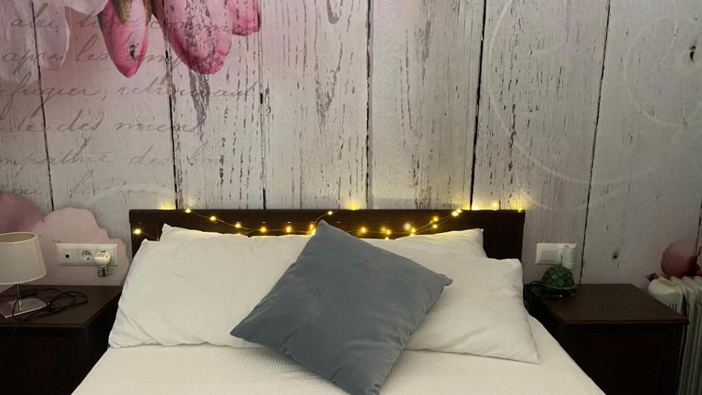 Posteľ alebo postele v izbe v ubytovaní Hope's ático-apartamento