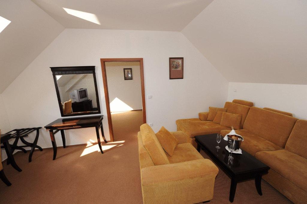 Posezení v ubytování Hotel U Zeleneho stromu