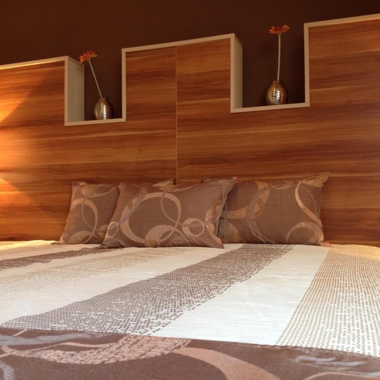 Posteľ alebo postele v izbe v ubytovaní Alfa Hotel