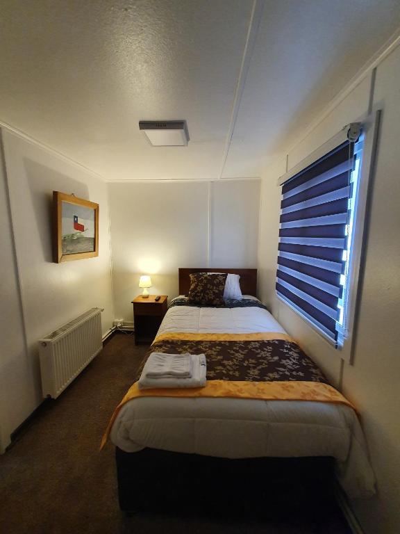 Postel nebo postele na pokoji v ubytování Hotel Forjadores del Cabo de Hornos